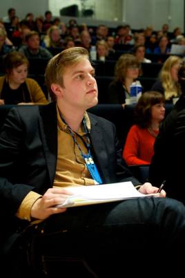 DSF's president Jakob Lindell Ruggaard (and me in the background, not understanding any of the debate in Danish)